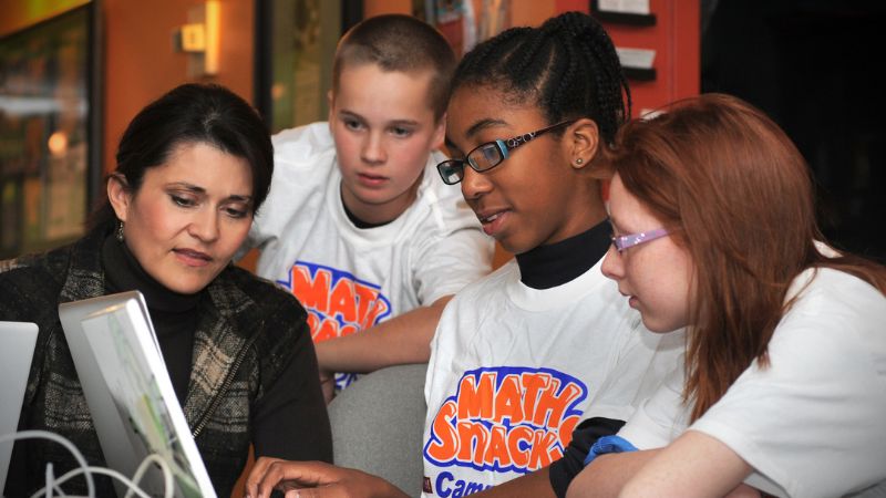 Image of young children working on the computer